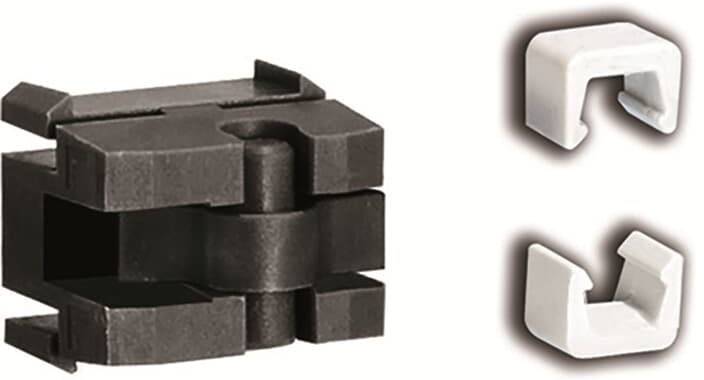 Pièce de fixation noire avec deux extrémités de serrage en plastique blanc. Sert probablement à fixer des câbles ou des composants.