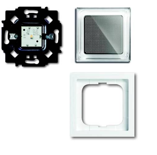 L'illustration montre trois parties d'un interrupteur : un insert noir, un bouton-poussoir carré et un cadre blanc.