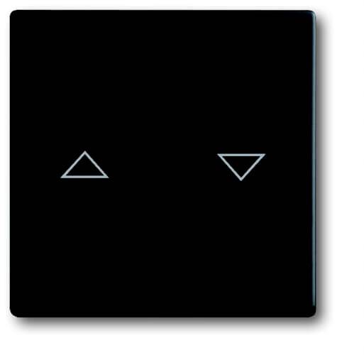 Surface tactile carrée noire avec deux symboles de flèches illuminés : à gauche une flèche pointant vers le haut, à droite une flèche pointant vers le bas.