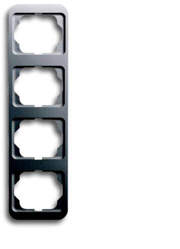 Schéma d'un cadre noir quadruple pour prises de courant ou interrupteurs, orienté verticalement, avec quatre emplacements vides.