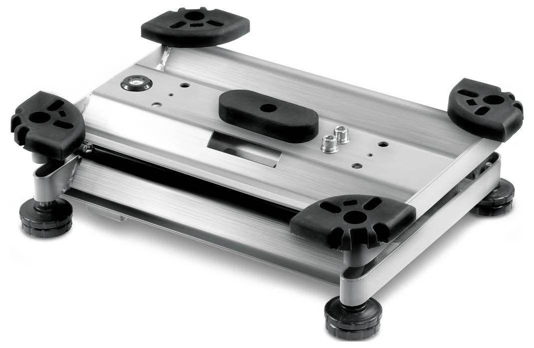 Un cadre métallique argenté, rectangulaire, avec quatre pieds en caoutchouc noir aux coins. Au centre se trouve un support noir.