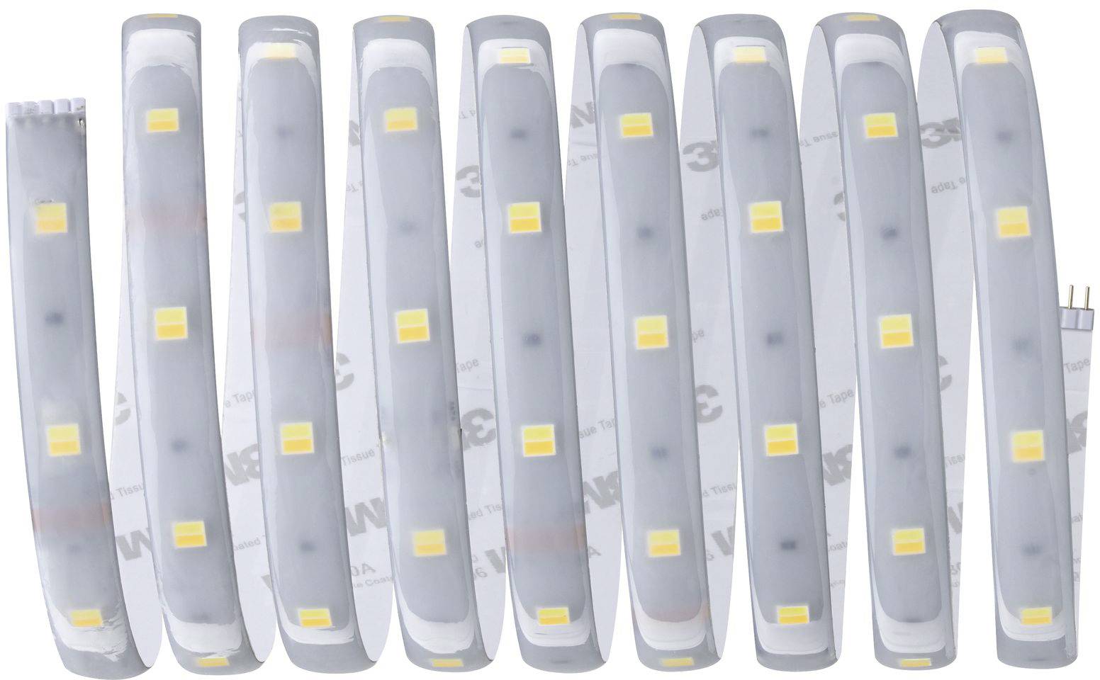 Bande de LED enroulée, avec des diodes jaunes sur un ruban gris. L'arrière-plan montre la face adhésive de 3M.