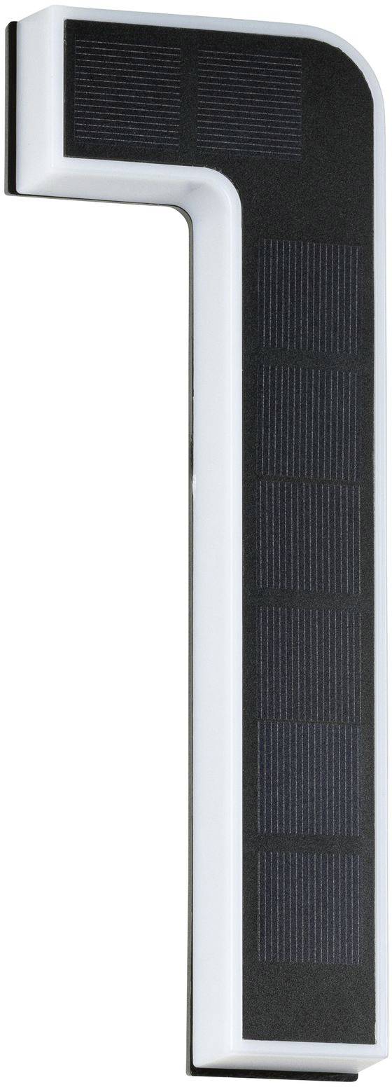 Un objet blanc en forme de L avec des panneaux solaires noirs intégrés.