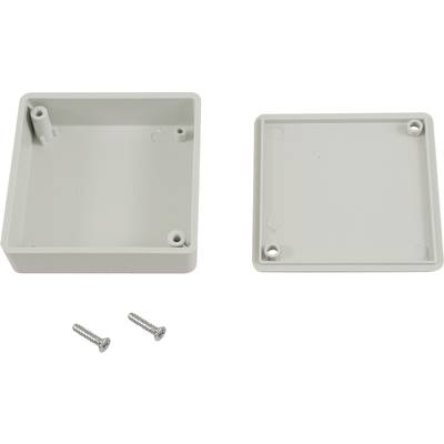 Boîtier en plastique avec couvercle retiré et deux vis ; utilisé pour des projets électroniques ou le rangement.