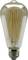 Une ampoule classique avec filament visible, qui brille avec élégance. Elle a une forme en goutte de verre avec une douille argentée.
