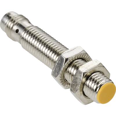 Capteur de proximité cylindrique en métal avec filetage, deux écrous et pointe jaune, utilisé pour la détection d'objets dans les machines.