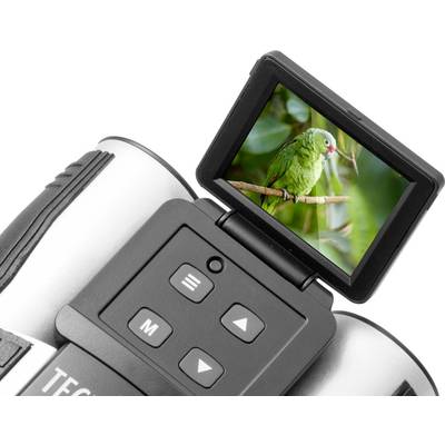Appareil photo numérique avec écran escamotable, montrant un perroquet vert perché sur une branche. Les commandes techniques sont visibles.