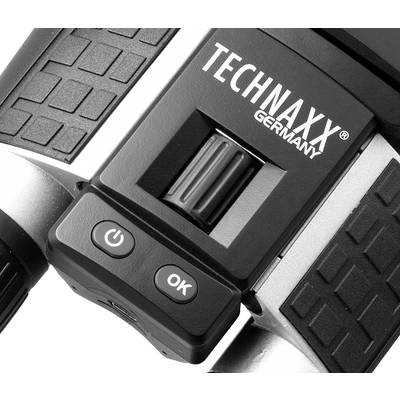 Gros plan d'une partie d'un appareil électronique portant l'inscription 'TECHNAXX GERMANY', avec une roue et deux boutons : 'Power' et 'OK'.