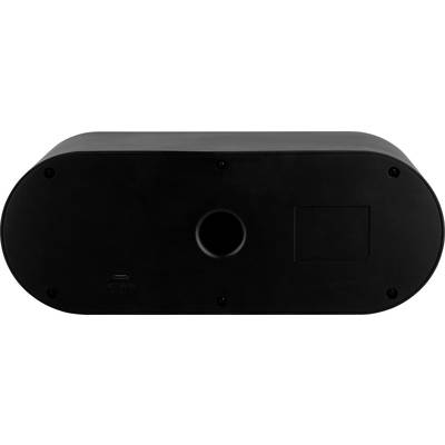 Appareil noir, allongé et ovale avec un trou central et un port USB-C, vue de dessous.