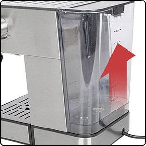 Machine à café argentée avec un indicateur de niveau d'eau transparent ; une flèche rouge pointe sur l'échelle de niveau d'eau.