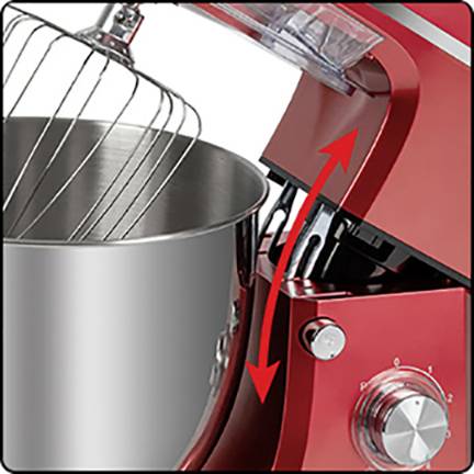 'Robot de cuisine rouge avec fonction de levage. La tête de la machine peut être soulevée pour accéder au bol mélangeur.'