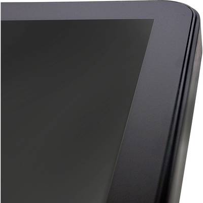 Le coin d'un écran noir rectangulaire ou d'un appareil, probablement une tablette ou un moniteur, à la surface brillante.