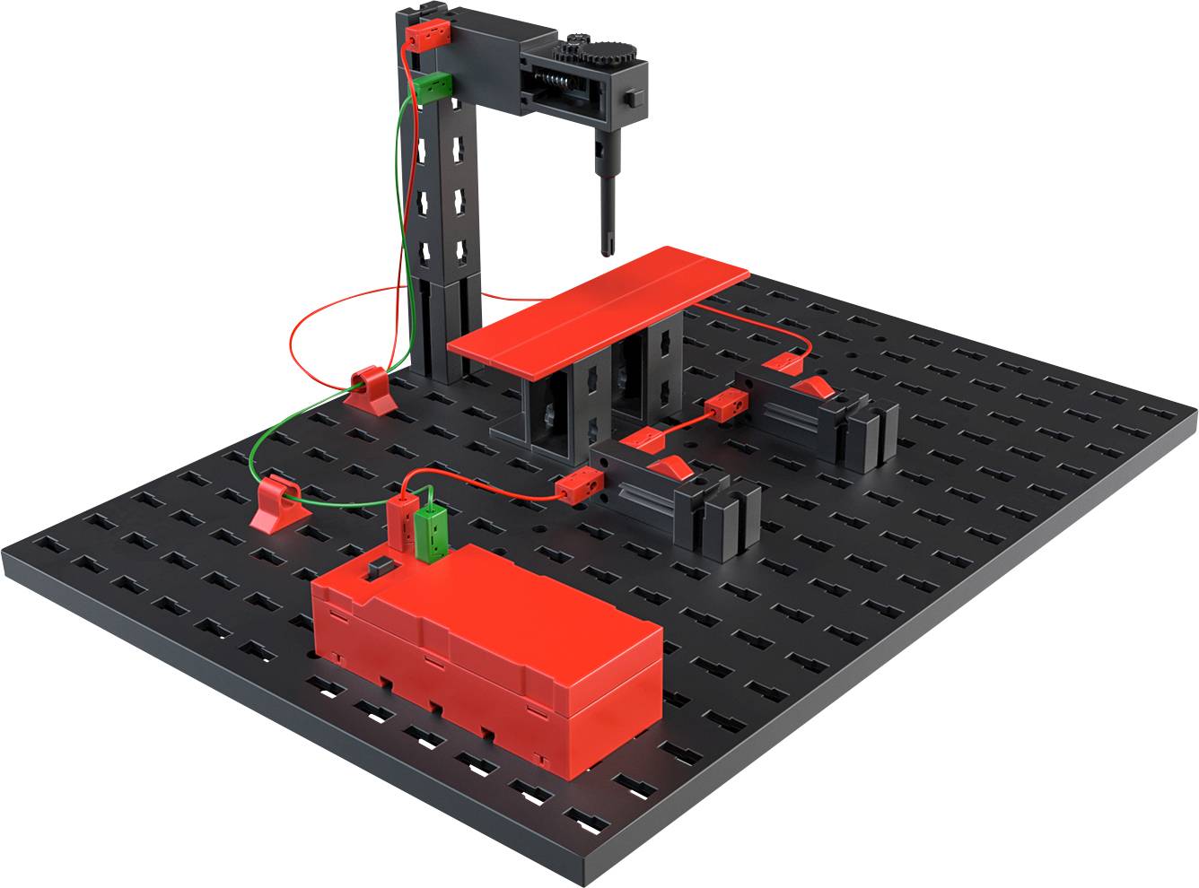 Un kit d'apprentissage avec des blocs pour expérimenter dans le domaine de l'électrotechnique, composé d'une plaque d'essai et de composants électriques.