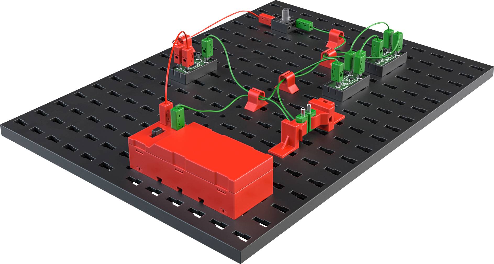 Circuit électronique avec des composants rouges et verts, reliés par des fils sur une plaque de base noire perforée.