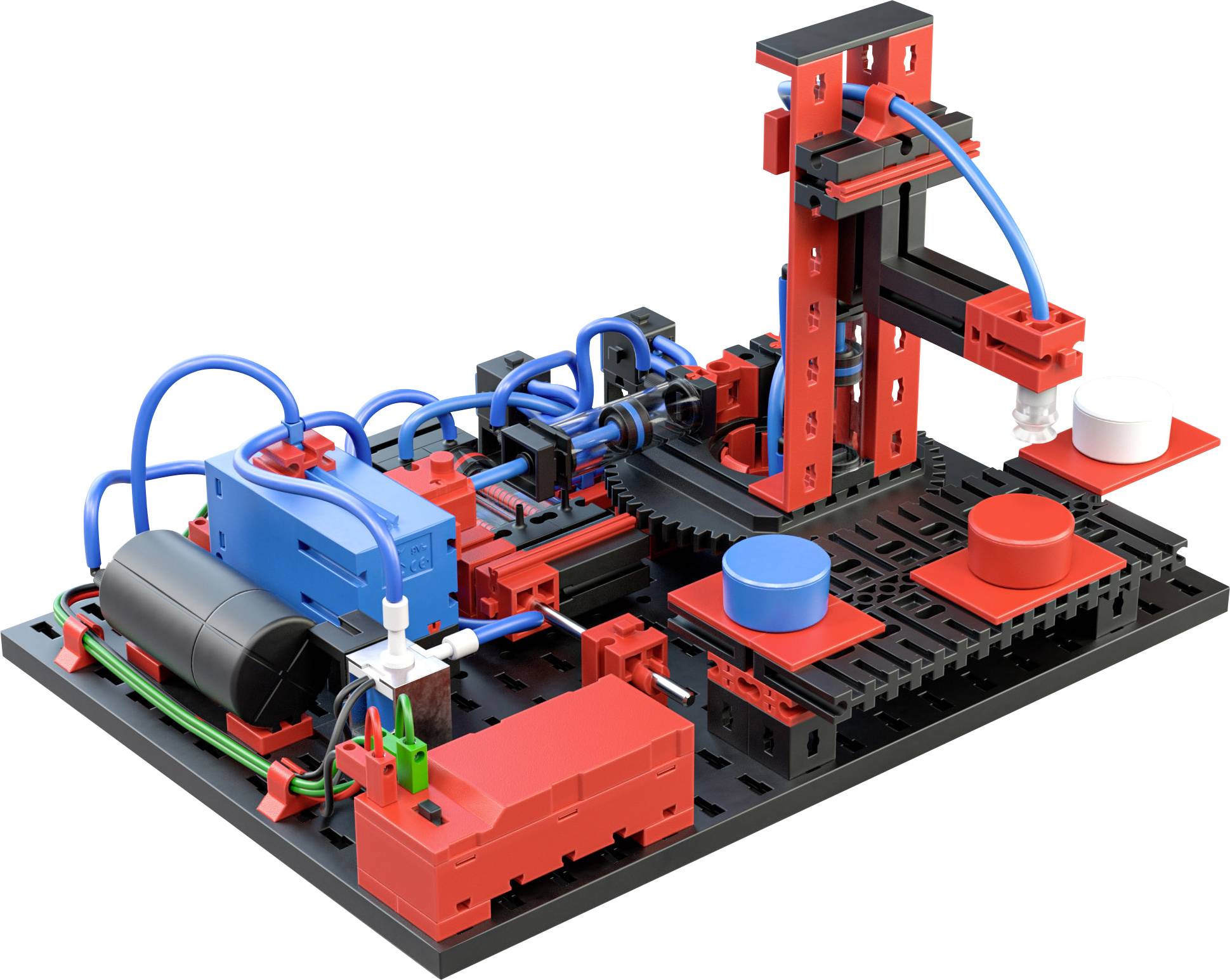 Un modèle modulaire représente une petite ligne de production avec un tapis roulant et un bras robotisé qui déplace des objets rouges et blancs.