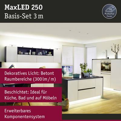 Un salon avec une cuisine moderne. Texte : 'Éclairage décoratif : met en valeur les zones de l'espace, la cuisine, la salle de bain et les meubles'. Système MaxLED 250.