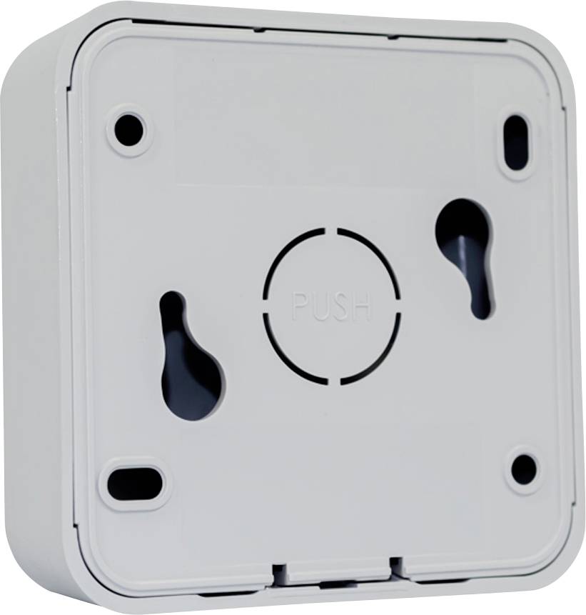 Un support blanc et carré, pouvant être fixé au mur, avec un bouton central portant l'inscription « PUSH ».