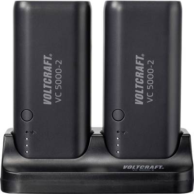 Deux batteries noires 'Voltcraft VC 5000-2' posées sur un chargeur, avec des voyants LED.