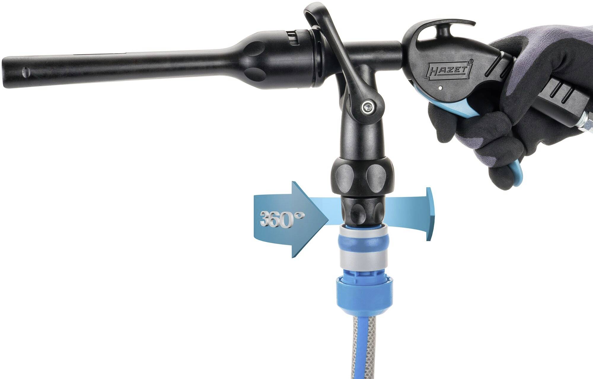 Un dispositif de pulvérisation manuelle avec une articulation rotative à 360 degrés permettant un positionnement flexible. Une main maintient fermement la poignée.