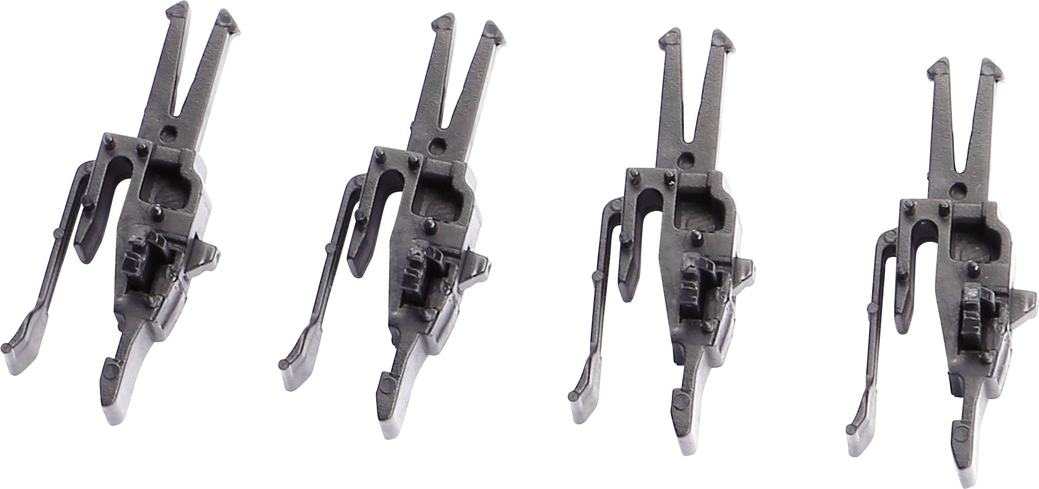 Quatre pièces d'outils LEGO noires identiques, disposées côte à côte sur un fond blanc.