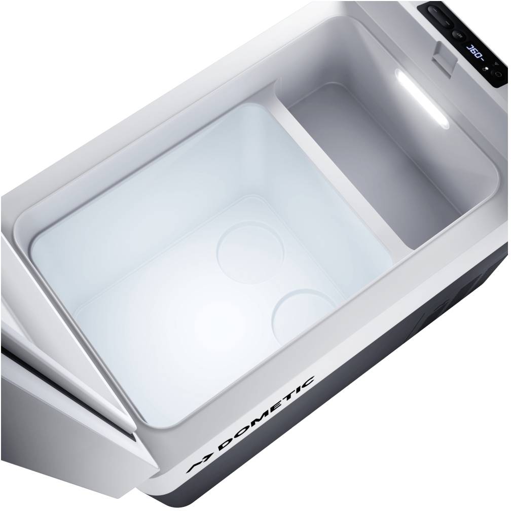 Glacière ouverte avec éclairage intérieur, ne montrant pas son contenu. Design simple et moderne pour des solutions de refroidissement portables.
