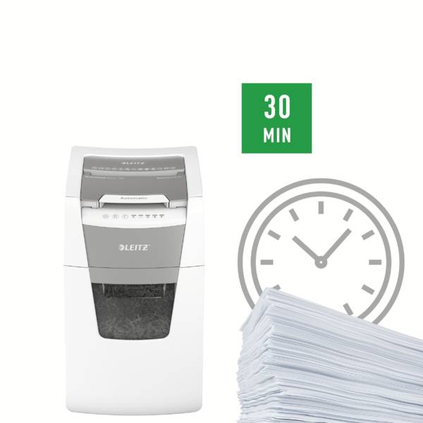 Un destructeur de documents à côté d'une pile de papiers et d'un affichage d'horloge indiquant '30 MIN', montrant le temps de fonctionnement.