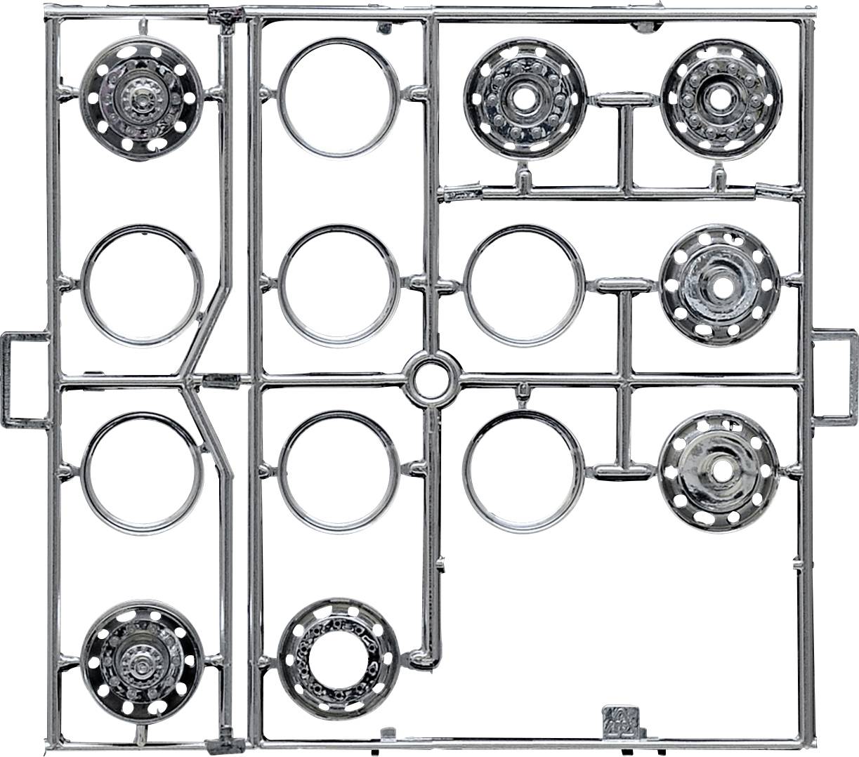 Un cadre de construction métallique avec des pièces rondes de différentes tailles fixées sur une grille.