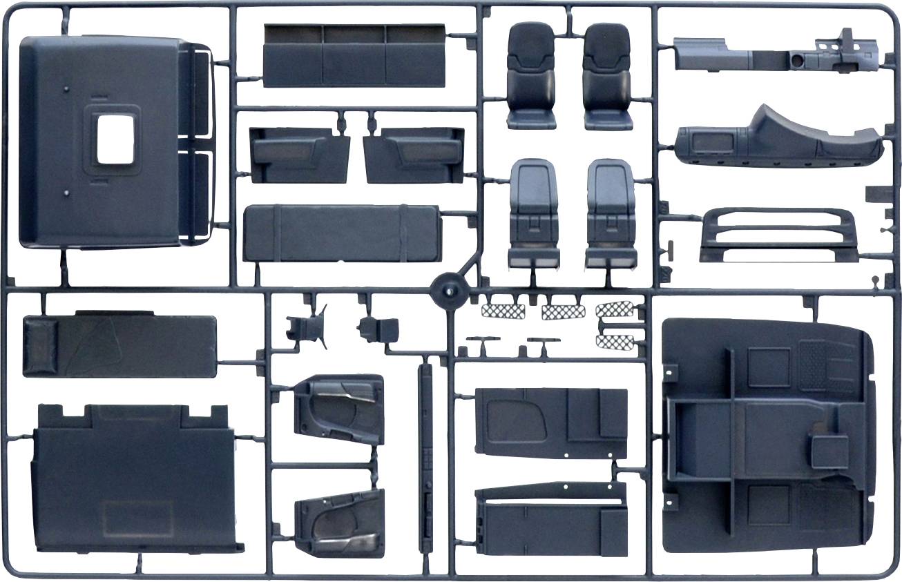 Kit de modélisme plastique de pièces automobiles sur cadre de moulage. Comprend des sièges, un tableau de bord, des portes et des composants de châssis.