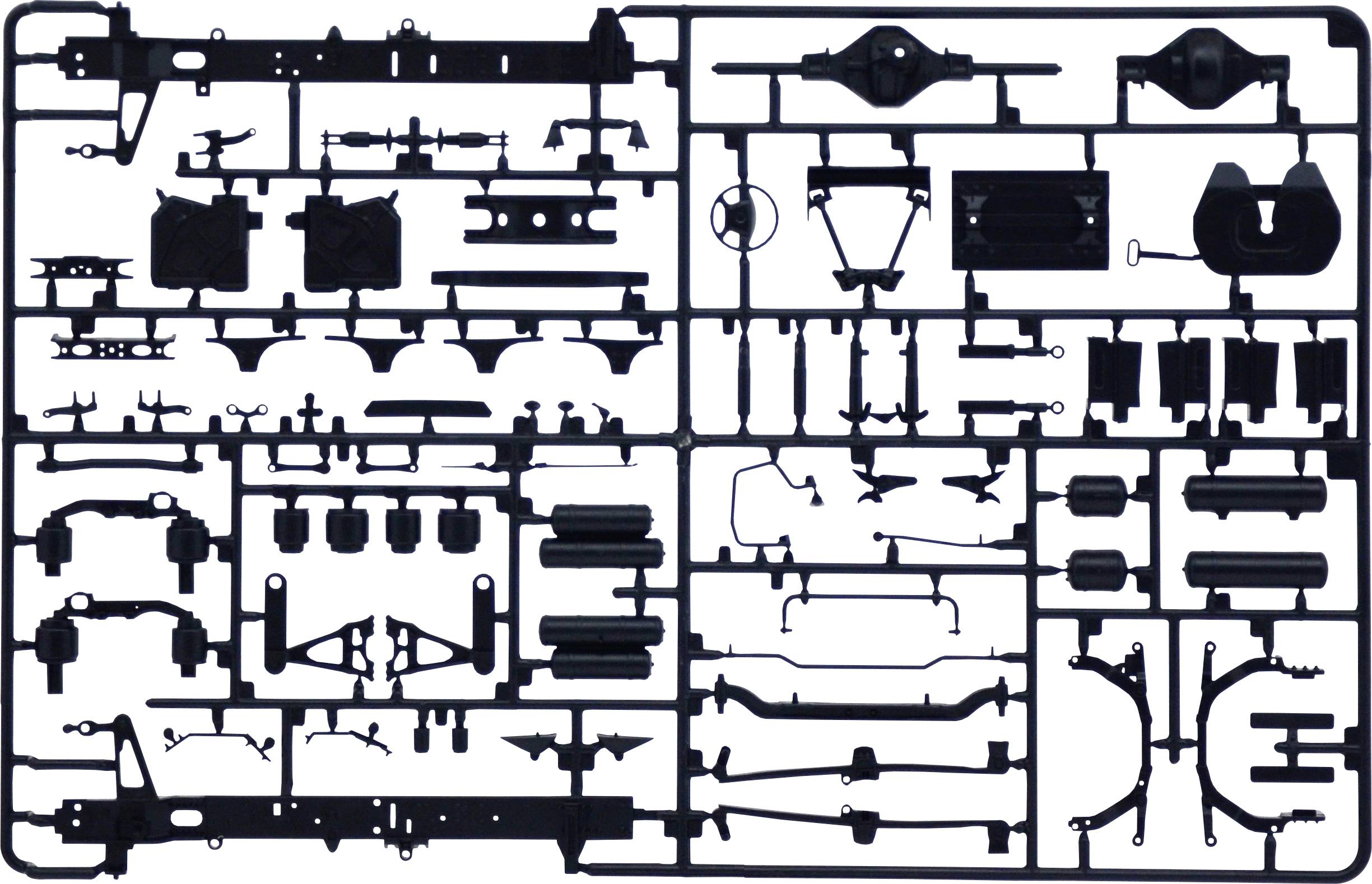 Kit de modélisme automobile comprenant de nombreuses pièces individuelles en plastique noir, triées dans un cadre grillagé.