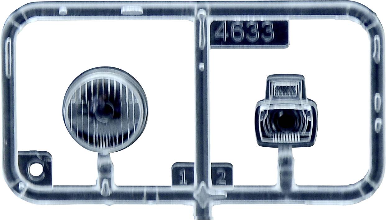 Pièces en plastique dans un cadre de coulée, numérotées '4633'. Partie ronde à gauche, partie carrée à droite. Composants de maquette pour montage.