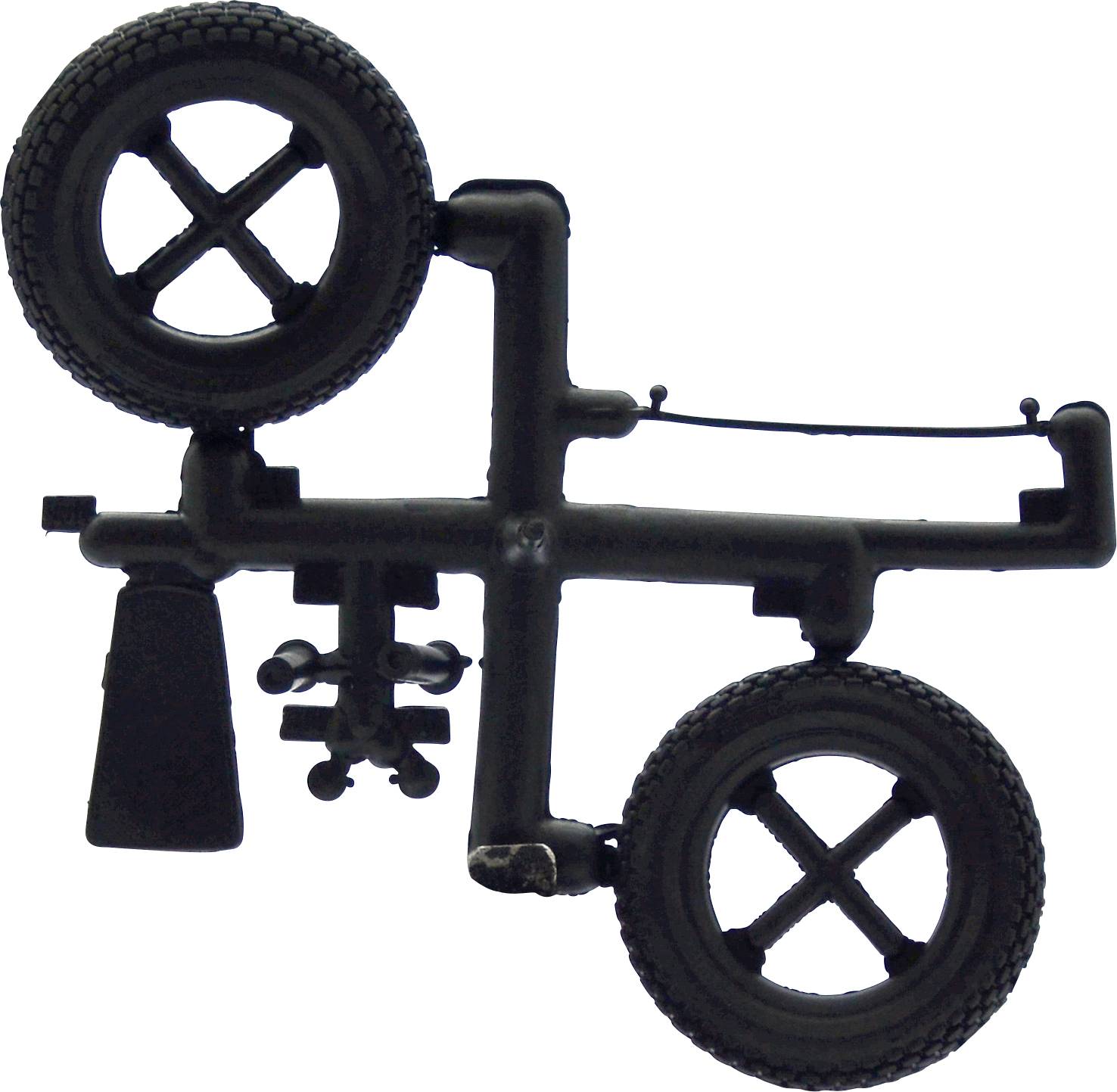 Pièces en plastique noir qui ressemblent à des composants de maquette, fixées sur un châssis de coulée avec deux roues.