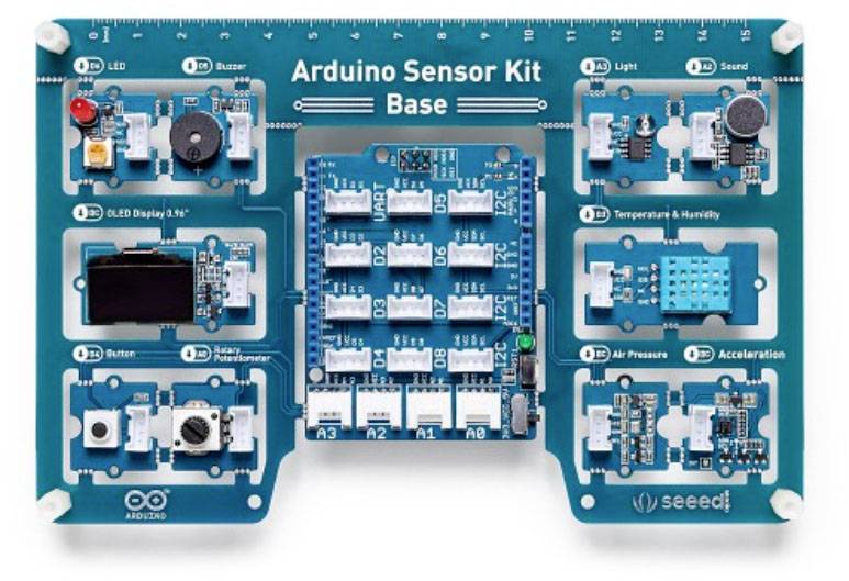 Image d'un kit de capteurs Arduino avec plusieurs capteurs et connexions sur une plaque de base bleue. Divers modules sont étiquetés.