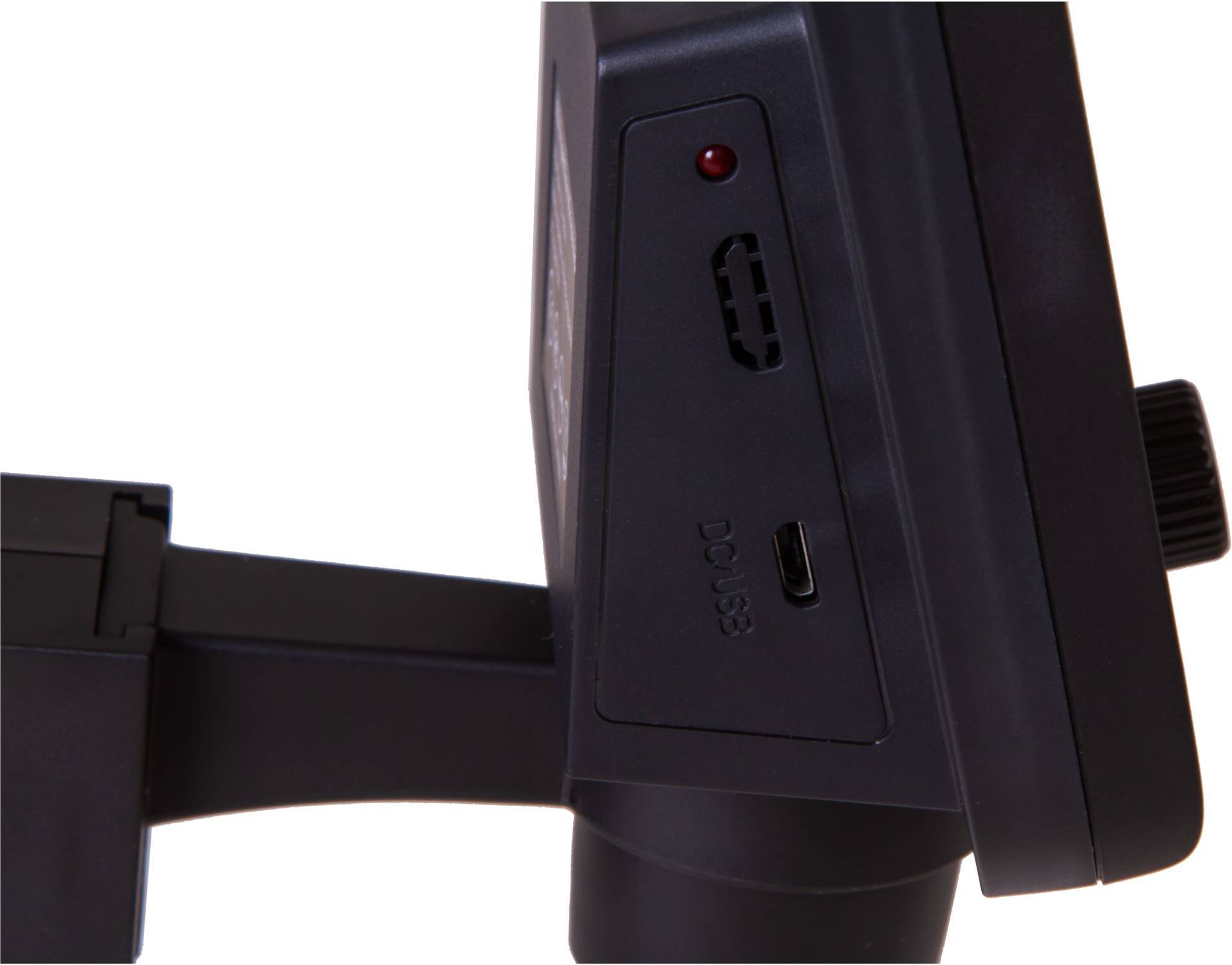 Vue unilatérale d'un appareil noir en plastique avec port USB et indicateur à LED rouge, monté sur un bras pivotant.