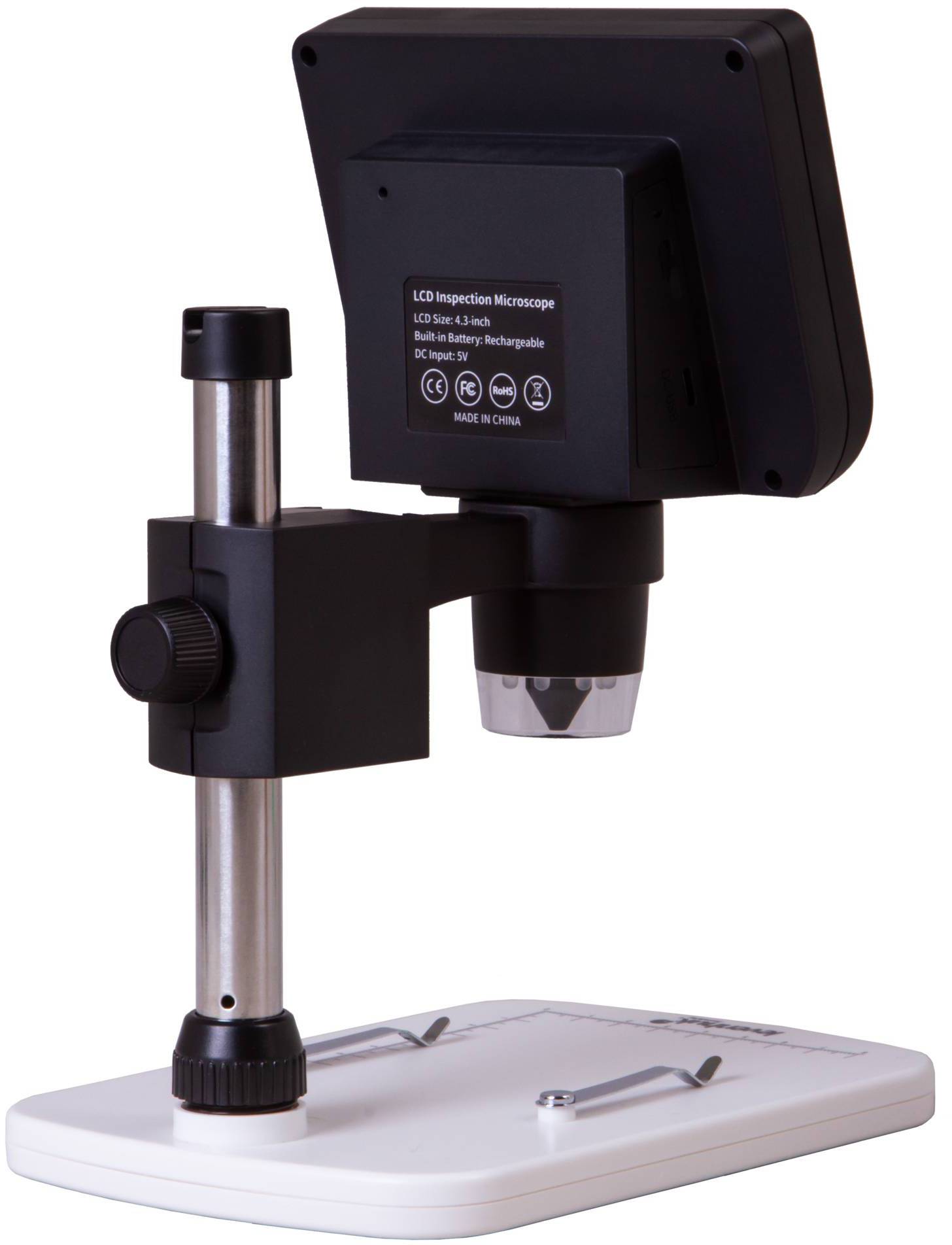 Microscope numérique avec écran LCD, bras télescopique et base stable, adapté à l'inspection de petits objets.