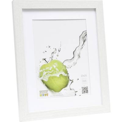 Un cadre blanc avec une photo d'un fruit vert entouré de projections d'eau. La photo est au format portrait.
