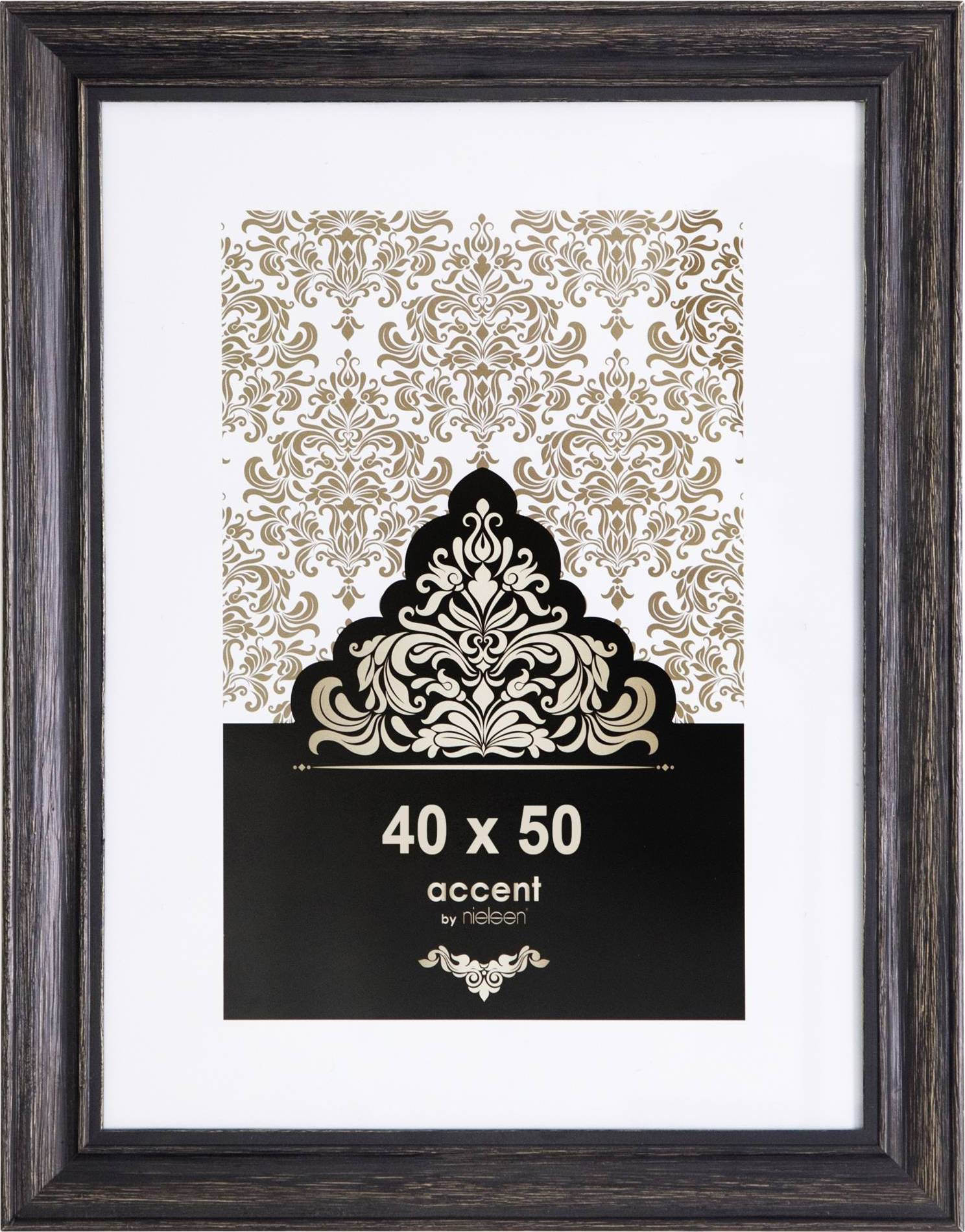 Cadre photo de 40 x 50 cm, décoré d'un motif ornemental doré en haut.