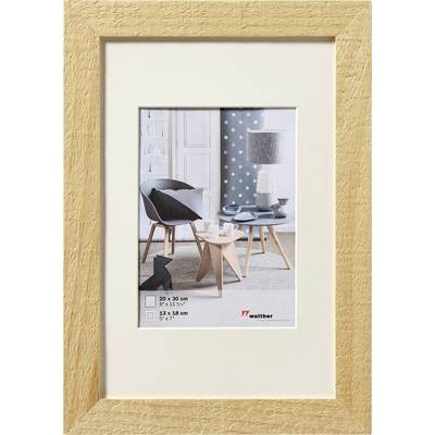 Un cadre blanc avec une image d'un salon moderne, présentant des meubles gris et une table ronde avec une décoration bleue.