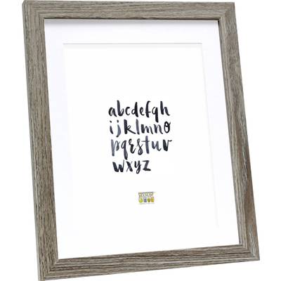 Cadre contenant une image avec des lettres manuscrites de l'alphabet en minuscules, de a à z, écrites à l'encre sombre sur un fond blanc.