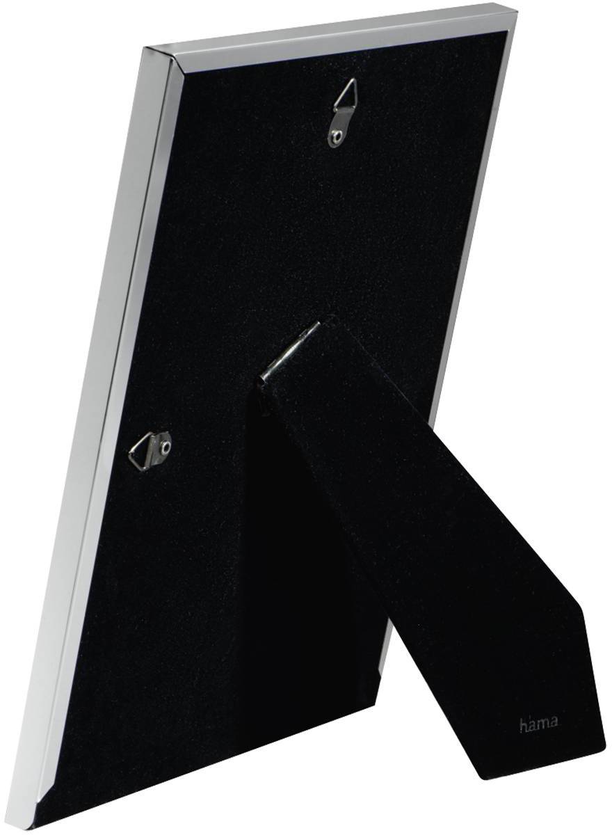 Vue arrière d'un cadre photo argenté dressé, avec un dos noir et un support de base.