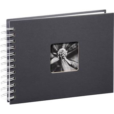 Un album photo noir à spirales avec une petite photographie carrée en noir et blanc d'une fleur sur la couverture.