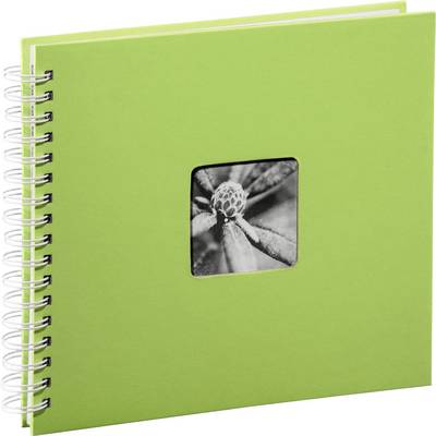 Carnet à spirales vert avec une petite photo en noir et blanc d'une fleur sur la couverture.
