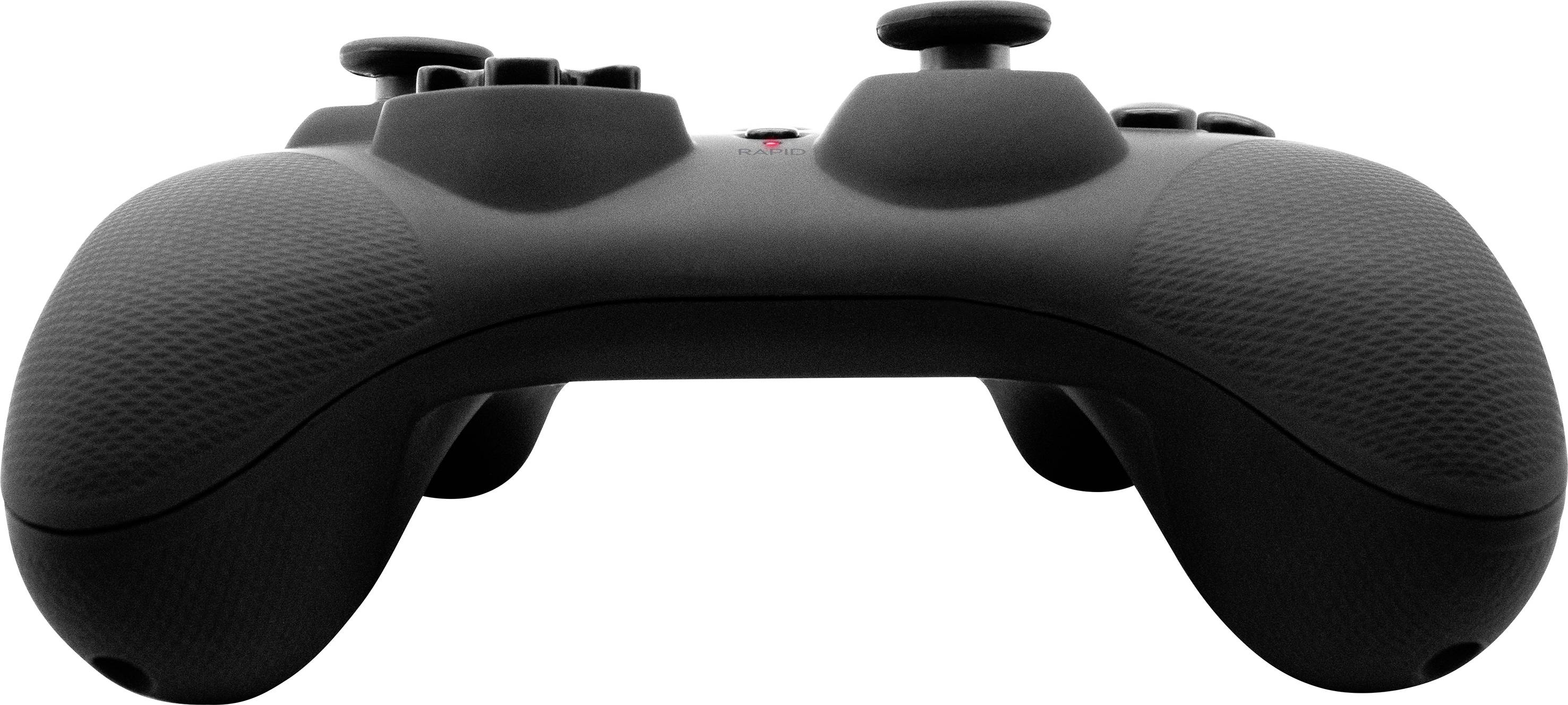 Un contrôleur de jeu vidéo noir avec deux manettes et plusieurs boutons est posé sur une surface plane.