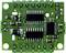 Circuit imprimé vert avec circuits intégrés, résistances et condensateurs. Principalement utilisé pour des applications technologiques.