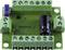 Une carte de circuit imprimé verte avec plusieurs blocs de bornes verts, un potentiomètre bleu portant l'inscription '500K' et un condensateur noir.