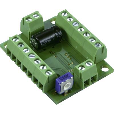 Une carte électronique verte avec plusieurs bornes à vis, un condensateur noir et un potentiomètre bleu.