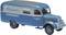 Camionnette historique de service IFA bleue avec l'inscription 'Service', sur un fond blanc.