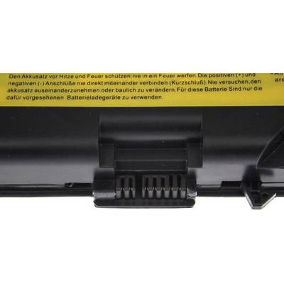 Batterie d'ordinateur portable avec une étiquette jaune d'avertissement qui met en garde contre la chaleur et le feu, et recommande de ne pas connecter ou modifier les bornes.