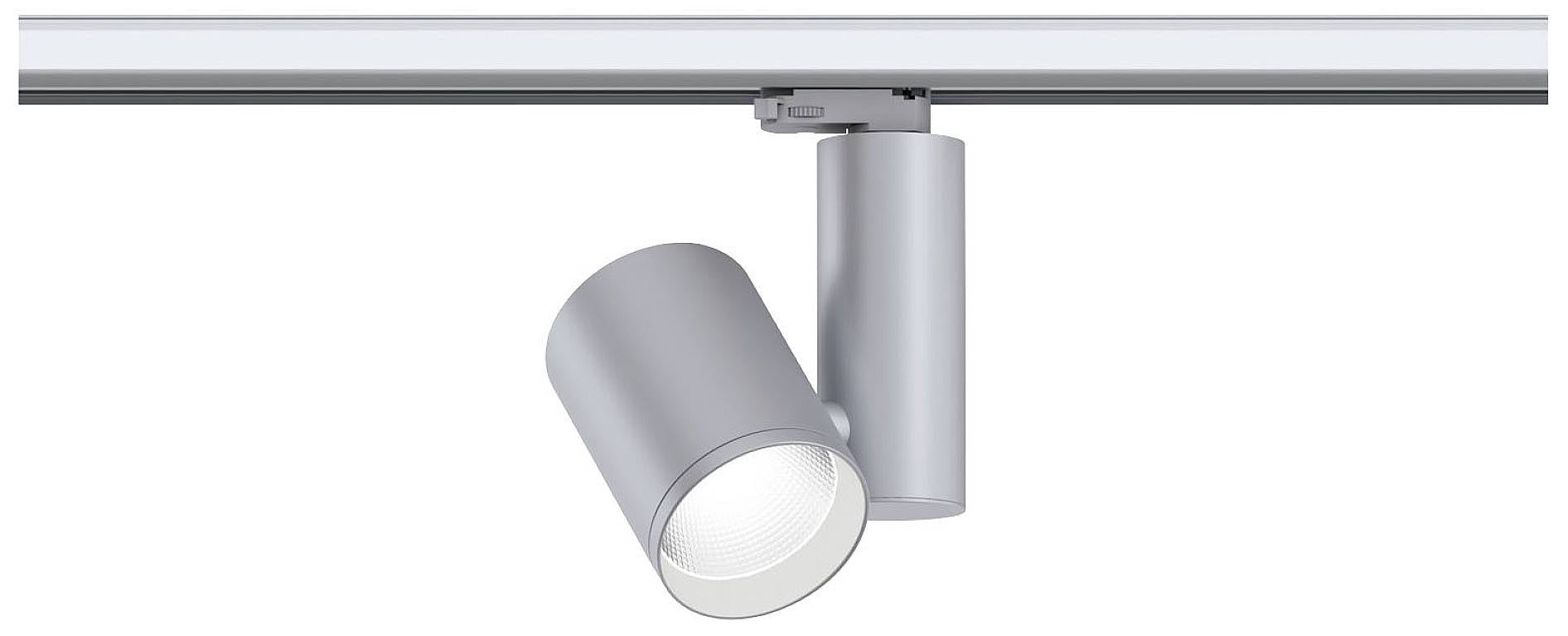 Un projecteur argenté monté sur rail, dirigé vers le bas. Idéal pour un éclairage ciblé dans les espaces intérieurs.