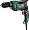 Un perçeuse électrique filaire verte de la marque Metabo, modèle BE 650, avec une poignée noire et un interrupteur rouge.