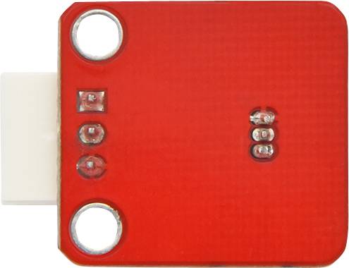 Un module électronique rectangulaire rouge avec trois points de contact ronds visibles et un connecteur blanc sur le côté.